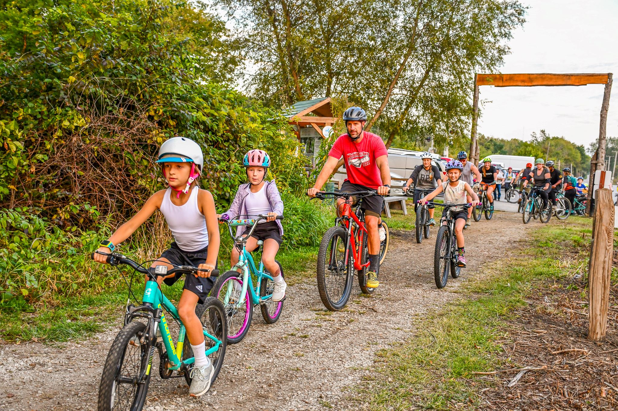 Family Riding Bikes Creekside Trails